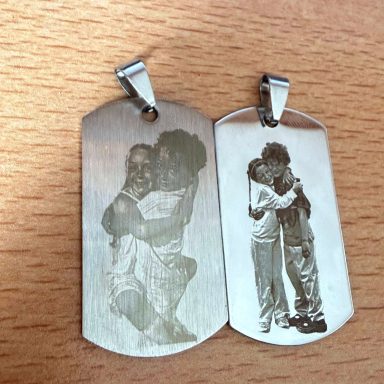 Photo pendants Two metal pendants personalised with an engraved family photograph